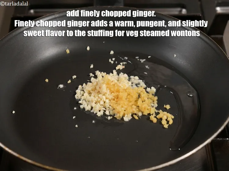 स्टेप 16 – १ टी-स्पून&nbsp;बारीक&nbsp;<a href=""https://www.tarladalal.com/glossary-chopped-ginger-hindi-786i"">कटा हुआ अदरक</a>&nbsp;डालें। बारीक कटा हुआ अदरक वेज …