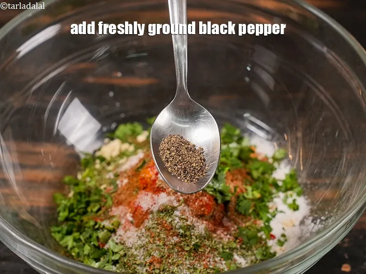 Step 16 – Add &frac14; tsp <a href="https://www.tarladalal.com/glossary-freshly-ground-black-pepper-kalimirch-powder-kali-mirch-ka-powder-567i">freshly ground black pepper (kalimirch)</a>.