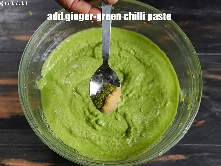 Step 16 – Add 1 tsp <a href="https://www.tarladalal.com/glossary-ginger-green-chilli-paste-adrak-mirch-ki-paste-adrak-mirchi-paste-139i">ginger-green chilli paste</a>.&nbsp;