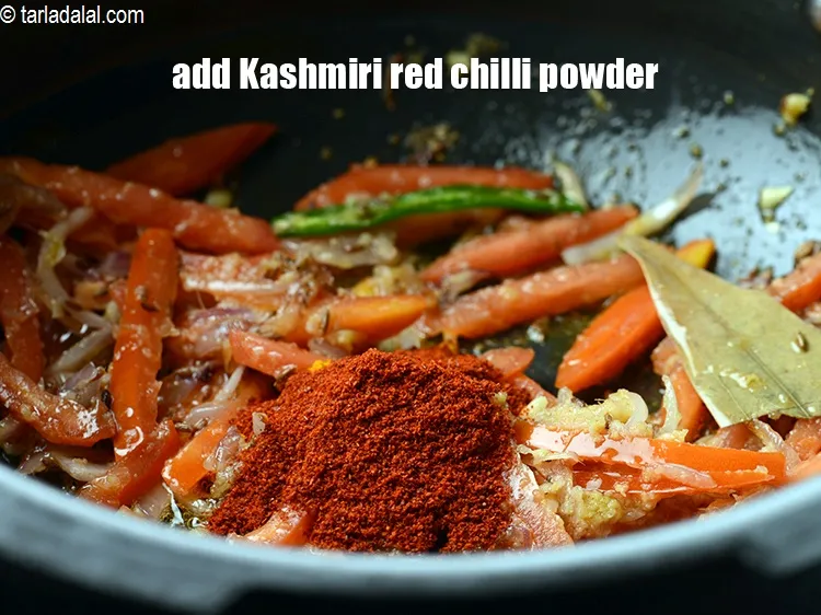 Step 16 – Add 1 tsp <a href="https://www.tarladalal.com/glossary-kashmiri-red-chilli-powder-kashmiri-mirch-powder-2684i">kashmiri red chilli powder</a>.
