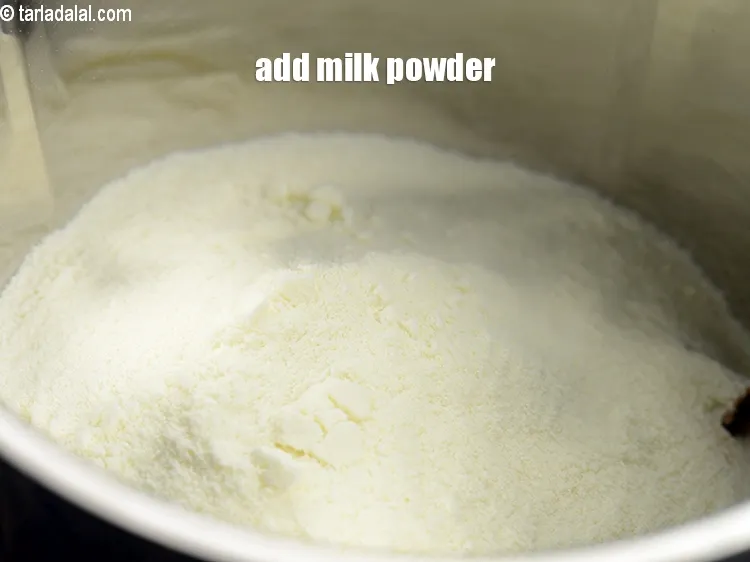 Step 16 – Add &frac12; cup <a href="https://www.tarladalal.com/glossary-milk-powder-517i">milk powder</a>.