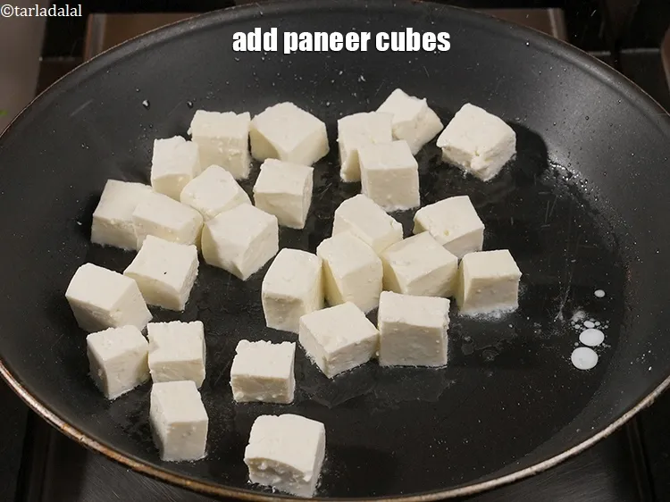 Step 16 – Add 2 cups <a href="https://www.tarladalal.com/glossary-paneer-cubes-cottage-cheese-cubes-1002i">paneer (cottage cheese) cubes</a>.