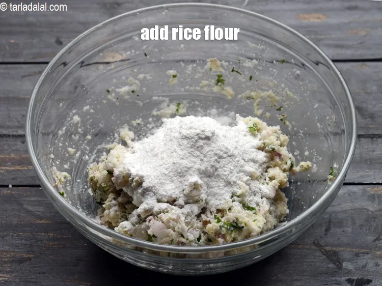 Step 16 – Add&nbsp;<a href="https://www.tarladalal.com/glossary-rice-flour-chawal-ka-atta-534i">rice flour (chawal ka atta)</a>.