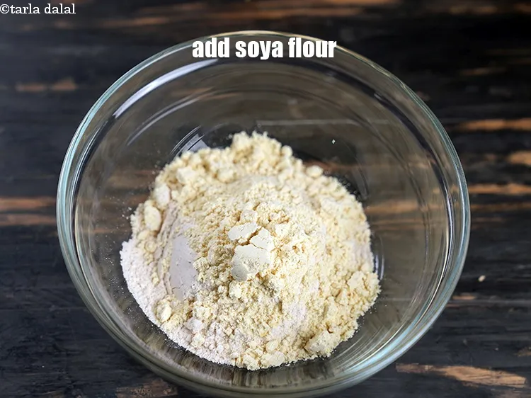 Step 16 – Add 1/4 cup <a href="https://www.tarladalal.com/glossary-soy-flour-soya-flour-soya-atta-617i">soya flour</a>.