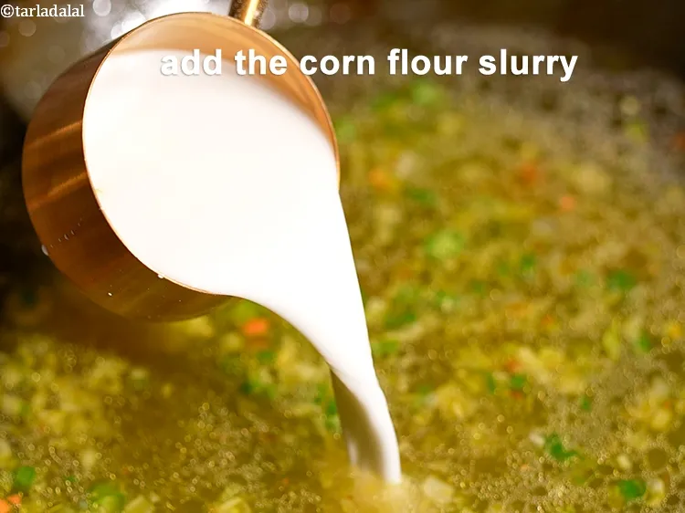 Step 19 – Add the corn flour slurry. 2 tbsp&nbsp;<a href="https://www.tarladalal.com/glossary-cornflour-cornstarch-maize-starch-corn-flour-112i">cornflour</a>&nbsp;dissolved in 1/4 cup&nbsp;<a href="https://www.tarladalal.com/glossary-water-pani-647i">water</a>.