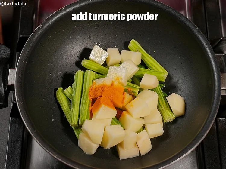 Step 16 – Add &frac12; tsp&nbsp;<a href="https://www.tarladalal.com/glossary-turmeric-powder-haldi-645i">turmeric powder (haldi)</a>.&nbsp;