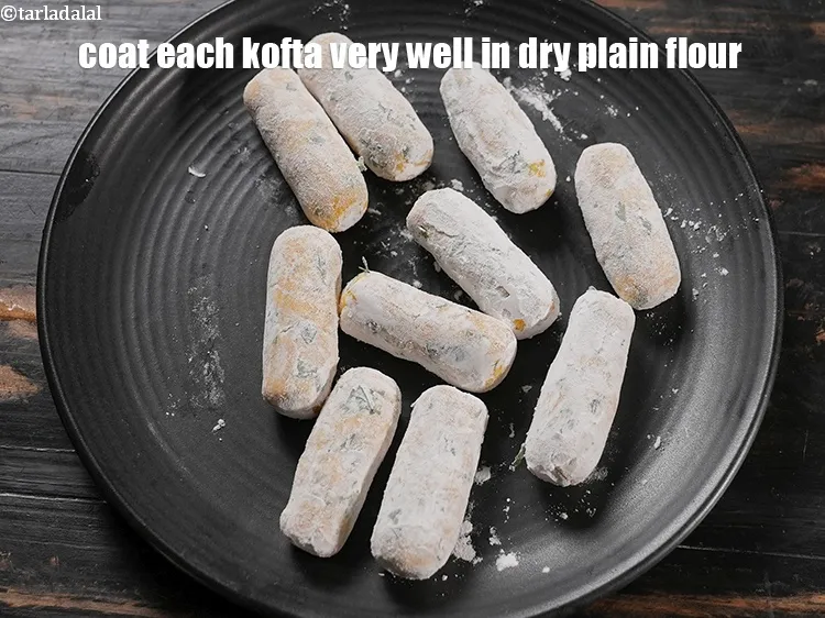 Step 17 – Coat each kofta very well in dry plain flour and keep aside.