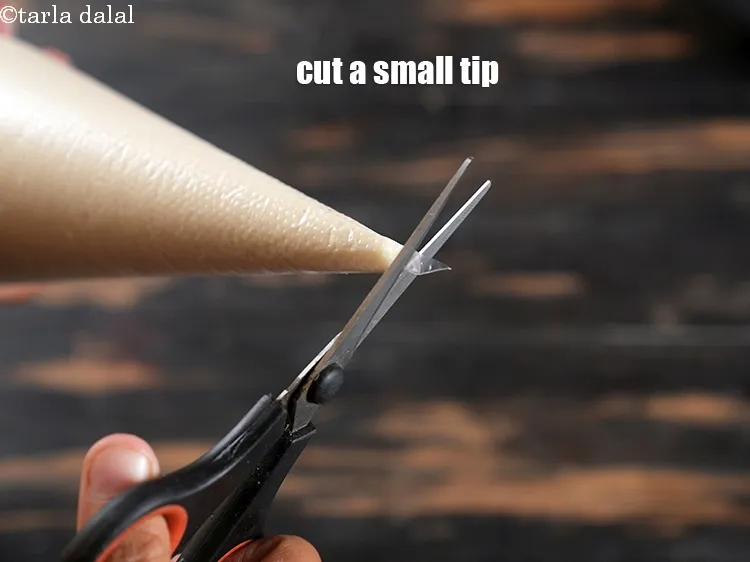 Step 18 – Cut a small tip or a thick cloth with a small hole in the center.