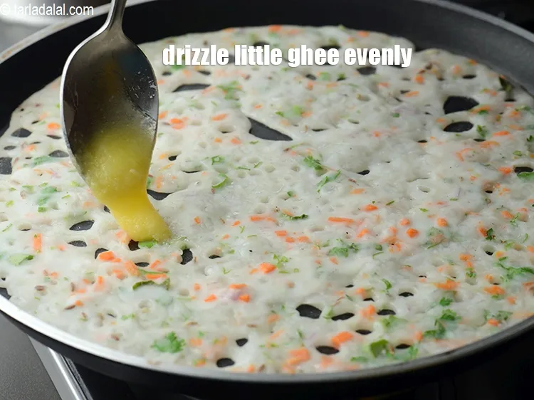 Step 18 – Drizzle a little ghee evenly over it.