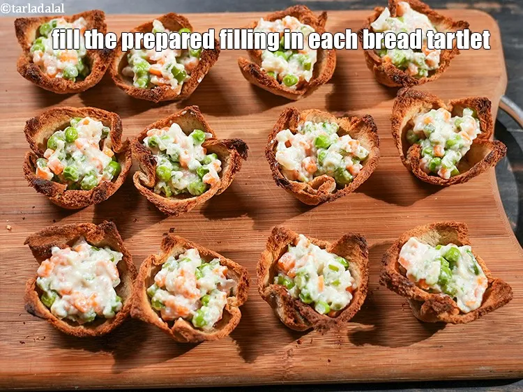 Step 22 – Fill 1 tbsp of the prepared filling in each bread tartlet.