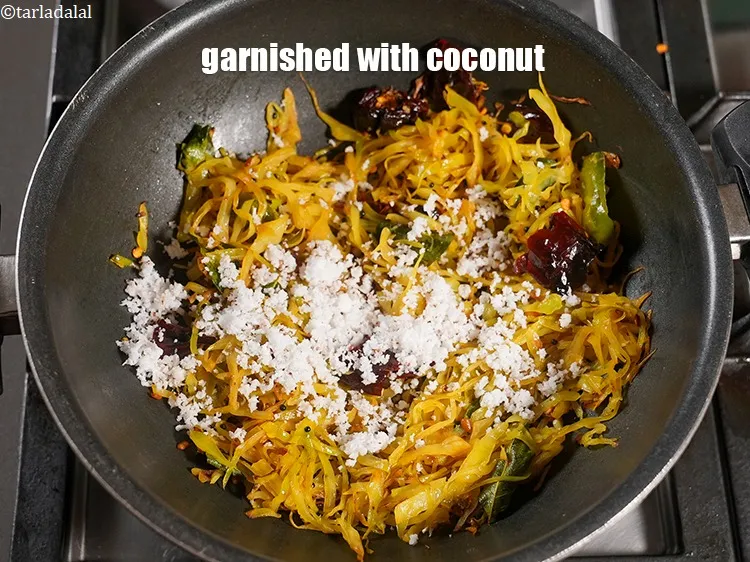 Step 17 – Garnished with fresh coconut.