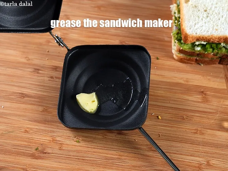 Step 16 – Grease the sandwich maker.