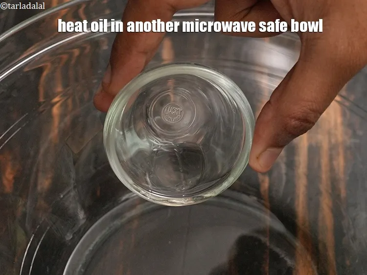 Step 16 – Heat 2 tsp oil in another microwave safe bowl.