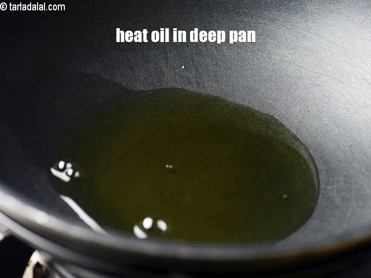 Step 17 – Heat 2 tbsp oil in a wok or deep pan.
