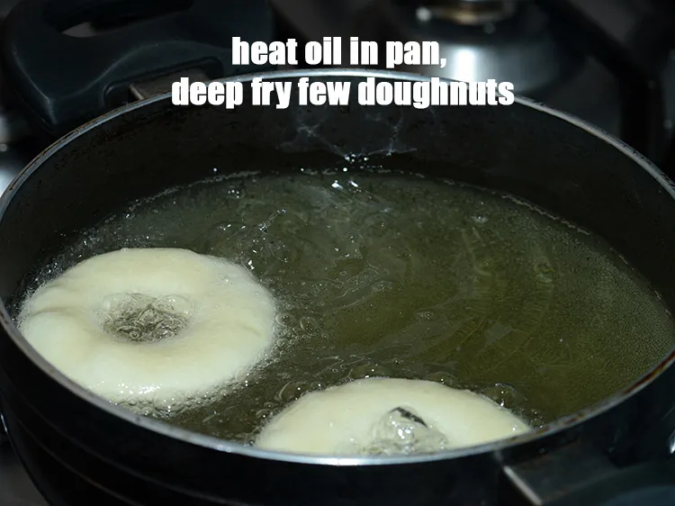 Step 16 – Heat oil in a deep pan, deep fry few doughnuts at a time.