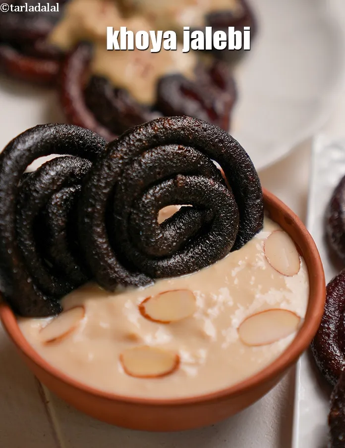 Step 22 – Serve<strong> mawa jalebi recipe | khoya jalebi | instant mawa jalebi | </strong>hot with rabdi.