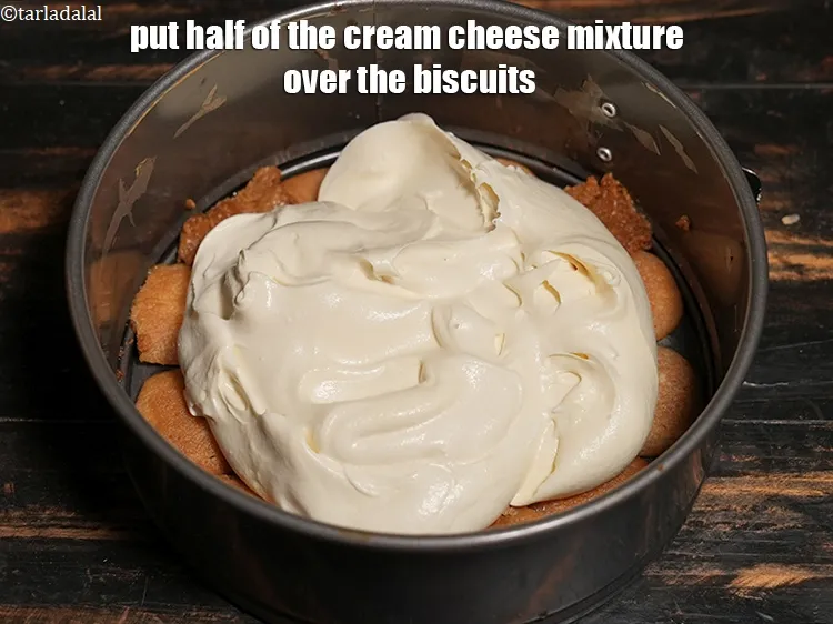 Step 16 – <p>Put half of the cream cheese mixture over the biscuits.</p>