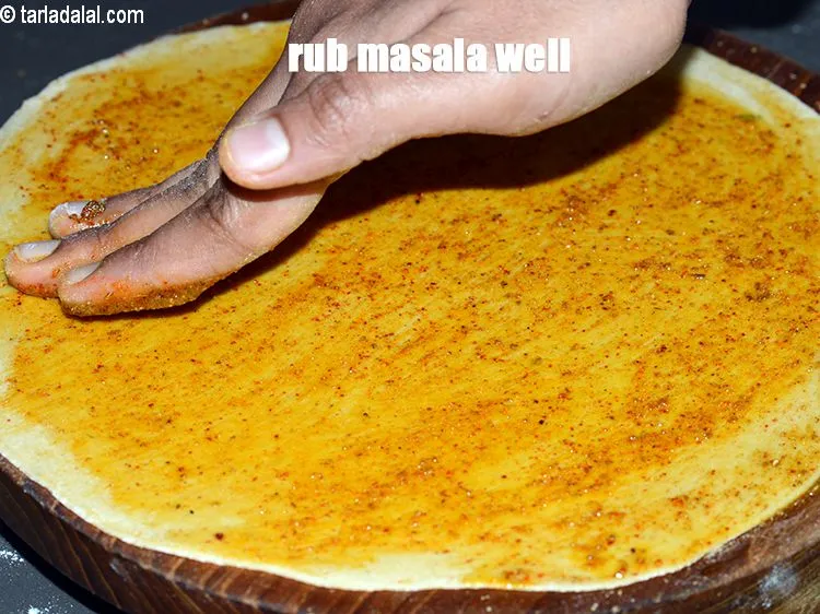 Step 16 – Rub the masala well.