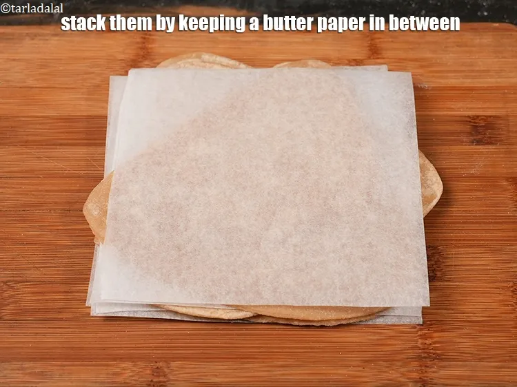 Step 19 – Stack them by keeping a butter paper in between.