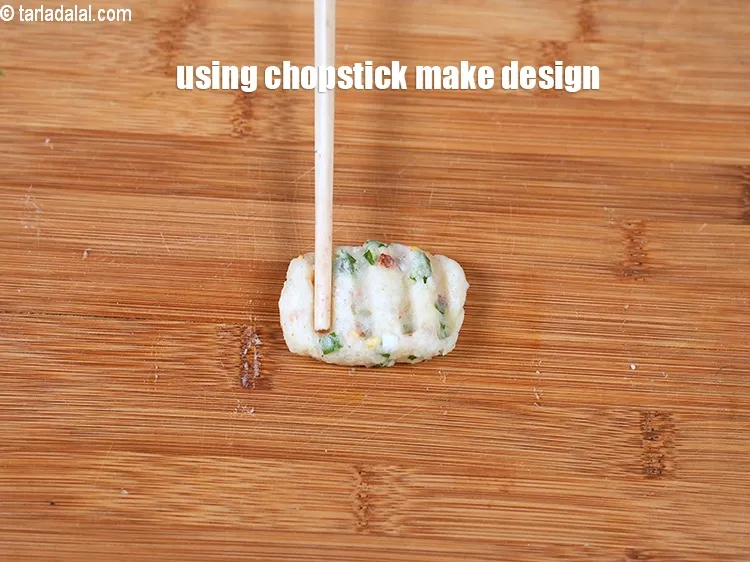 Step 16 – Using a chopstick make a design as shown.&nbsp;