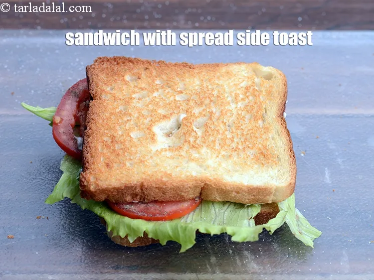 Step 16 – Sandwich with the spread side toast facing downwards.