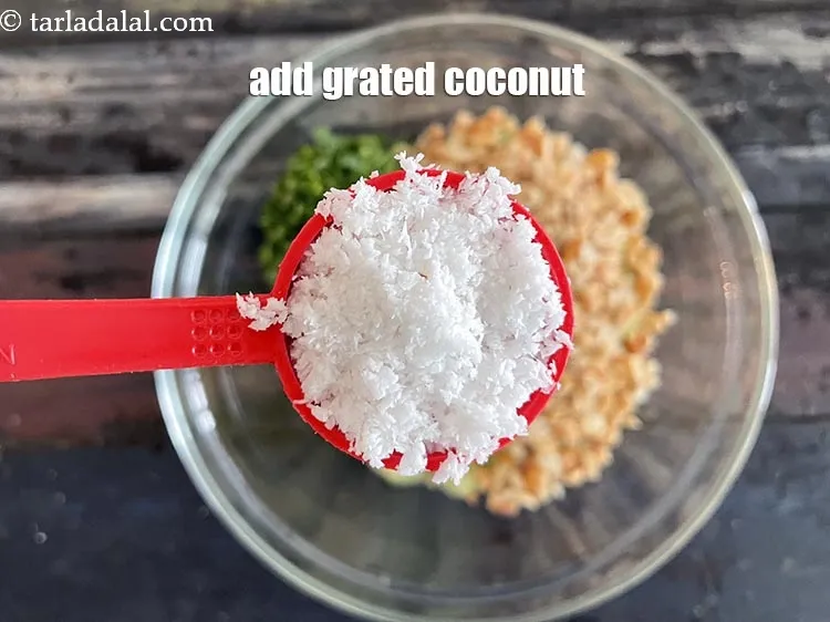 Step 18 – Add&nbsp;2 tbsp&nbsp;freshly&nbsp;<a href="https://tarladalal.com/glossary-grated-coconut-852i">grated coconut</a>.