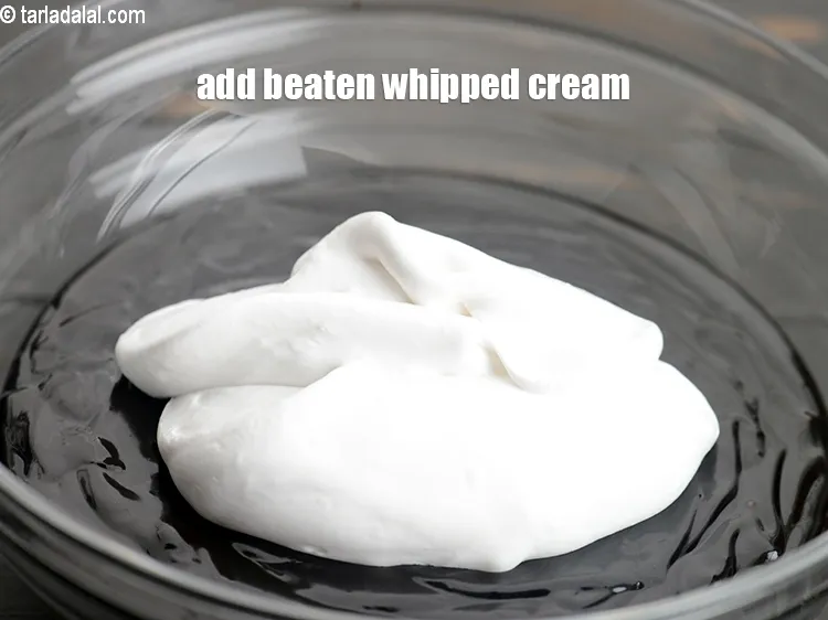 Step 15 – Add &frac34; cup of beaten whipped cream.