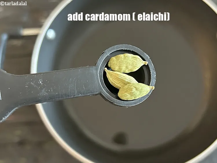 Step 29 – Add&nbsp;<meta charset="UTF-8" />3&nbsp;<a href="glossary-cardamom-elaichi-262i">cardamoms (elaichi)</a>.