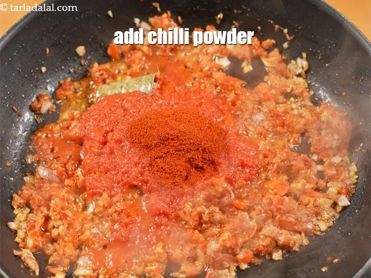 Step 16 – Add &frac12; tbsp <a href="https://www.tarladalal.com/glossary-chilli-powder-red-chilli-powder-339i">chilli powder</a>.
