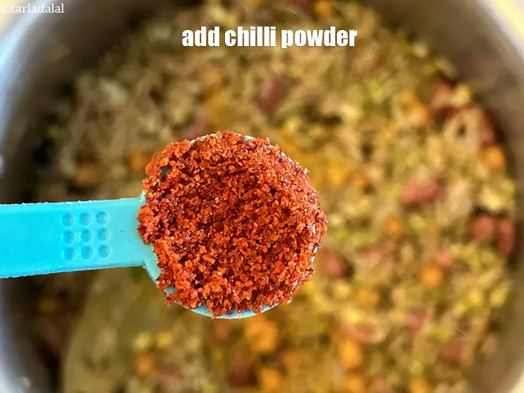 Step 24 – Add&nbsp;<meta charset="UTF-8" />1/2 tsp&nbsp;<a href="glossary-chilli-powder-red-chilli-powder-339i">chilli powder</a>.