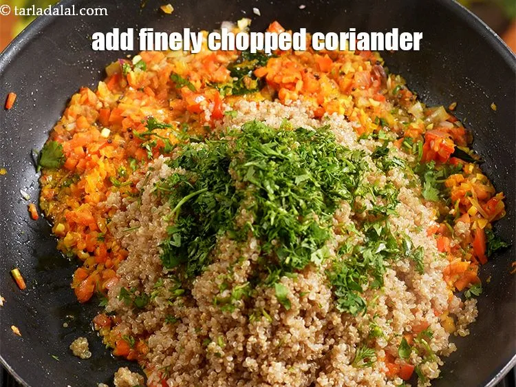 Step 16 – Add &frac14; cup finely <a href="https://www.tarladalal.com/glossary-chopped-coriander-783i">chopped coriander (dhania)</a>.
