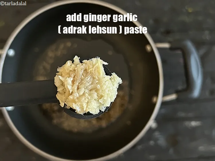 Step 22 – Add&nbsp;<meta charset="UTF-8" />1 tsp&nbsp;<a href="glossary-ginger-garlic-paste-adrak-lehsun-ki-pate-adrak-lahsun-ki-paste-939i">ginger-garlic (adrak-lehsun) paste</a>.