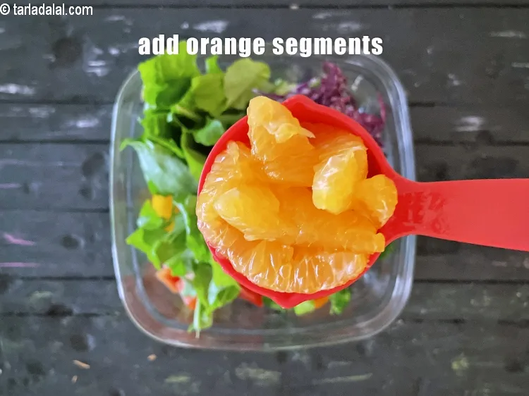 Step 18 – Add&nbsp;<meta charset="UTF-8" />1/4 cup&nbsp;<a href="glossary-orange-segments-116i">orange segments</a>.&nbsp;