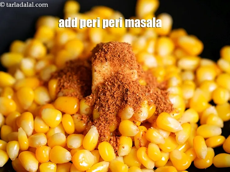 Step 25 – Add 1 &frac12; tsp peri peri masala.