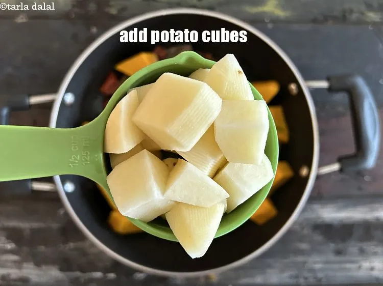 Step 16 – Add&nbsp;<meta charset="UTF-8" />1 cup&nbsp;<a href="glossary-potato-cubes-725i">potato cubes</a>.