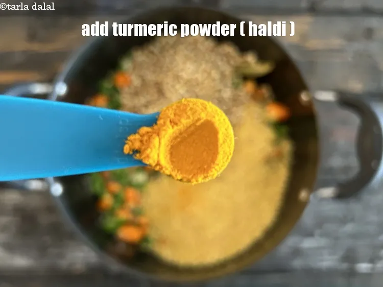 Step 16 – Add&nbsp;<meta charset="UTF-8" />1/4 tsp&nbsp;<a href="glossary-turmeric-powder-haldi-645i">turmeric powder (haldi)</a>.