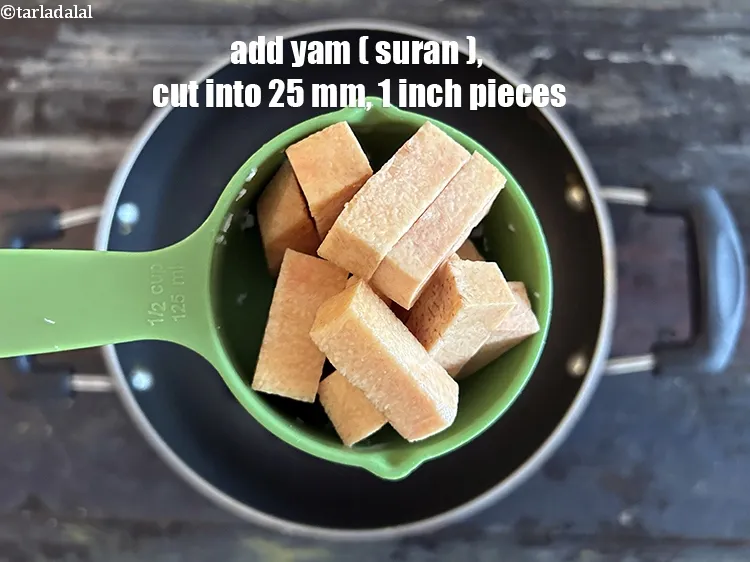 Step 16 – Add&nbsp;<meta charset="UTF-8" />1/2 cup&nbsp;<a href="glossary-yam-ratalu-suran-jimikand-485i">yam (suran)</a>&nbsp;, cut into 25mm (1&rdquo;) pieces.