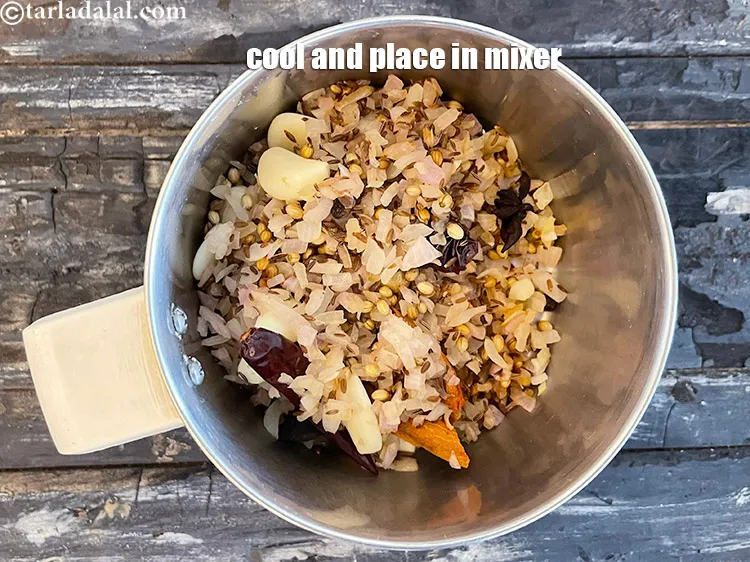 Step 24 – Keep aside to cool slightly and then place in a mixer.