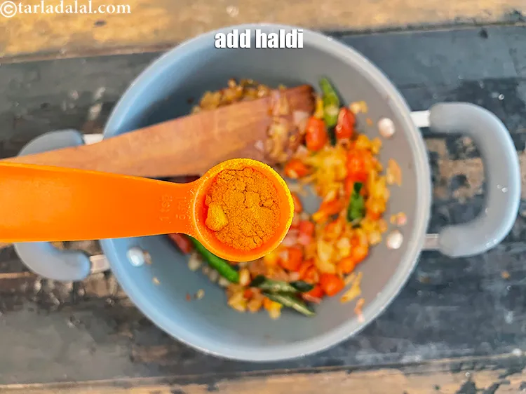 Step 17 – Add&nbsp;<meta charset="UTF-8" />1/2 tsp&nbsp;<a href="glossary-turmeric-powder-haldi-645i">turmeric powder (haldi)</a>.