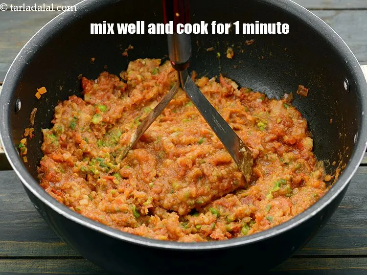 Step 21 – Mix well and cook on a medium flame for 1 minute, while mashing it using …