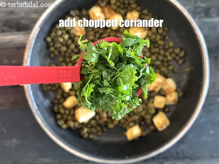 Step 26 – Add 1&nbsp;tbsp&nbsp;<a href="glossary-chopped-coriander-783i">chopped coriander (dhania)</a>.