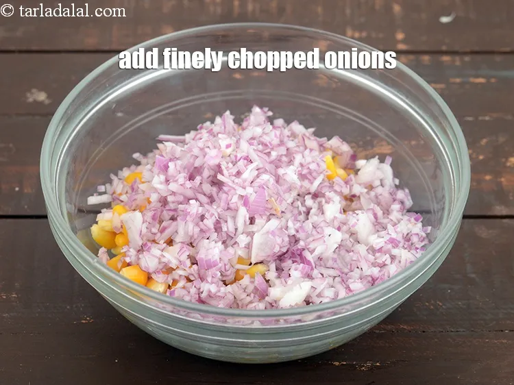 Step 22 – Add 1/2 cup&nbsp;finely&nbsp;<a href="https://www.tarladalal.com/glossary-chopped-onions-722i">chopped onions</a>.