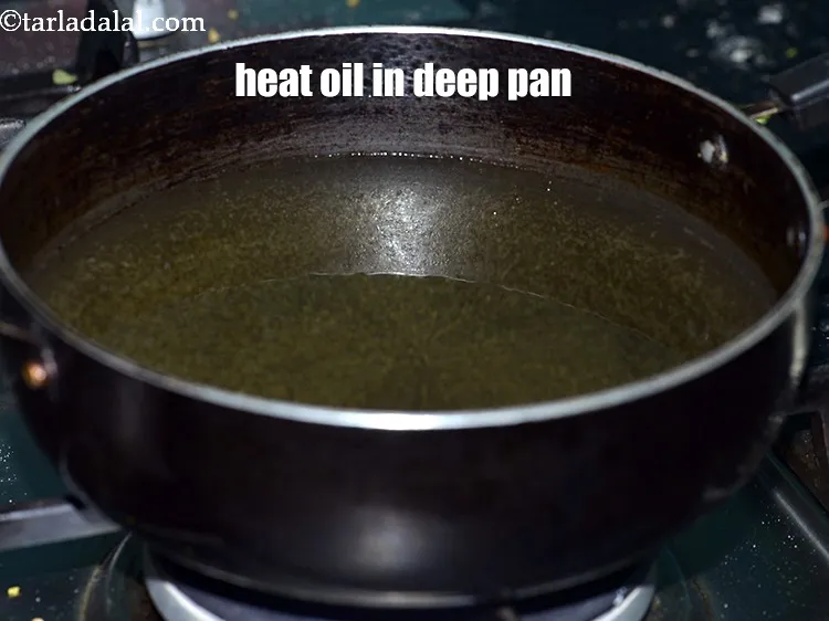 Step 17 – Heat the oil in a deep pan.