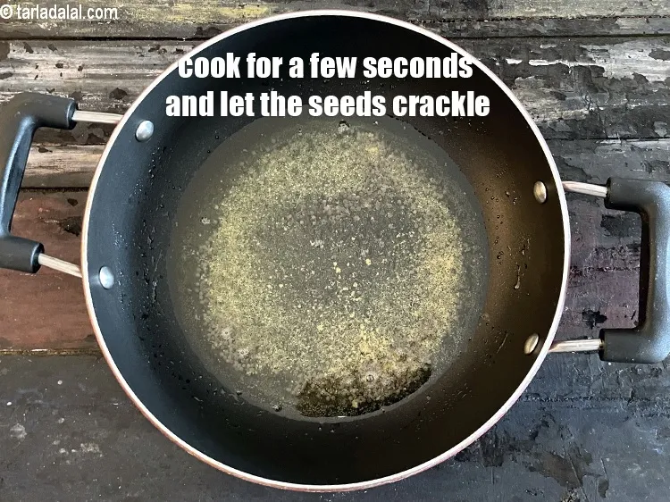 Step 17 – Cook for a few seconds and let the seeds crackle.
