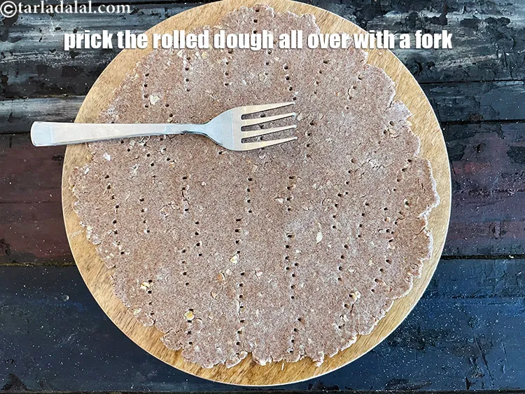 Step 16 – Prick them all over using a fork.