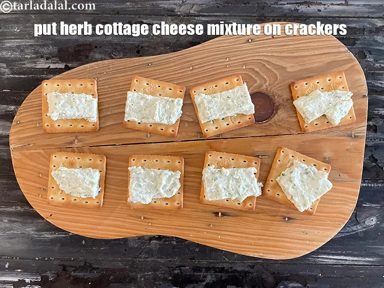 Step 17 – Place <strong>herb cottage cheese mixture&nbsp;</strong>on cream crackers.