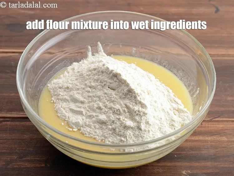 Step 17 – Add the flour mixture into the wet ingredients.