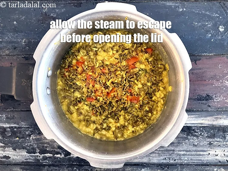 Step 16 – Allow the steam to escape before opening the lid.