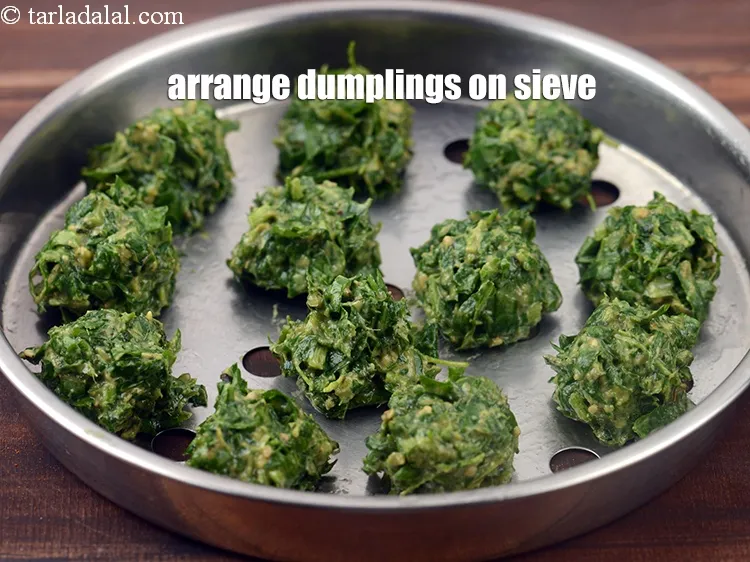 Step 16 – Arrange the dumplings on a greased sieve.