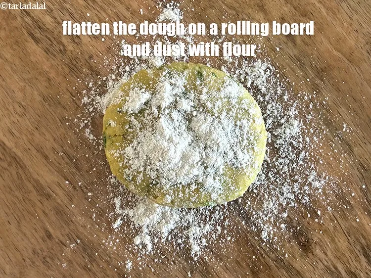 Step 25 – Flatten the dough on a rolling board and dust with flour.